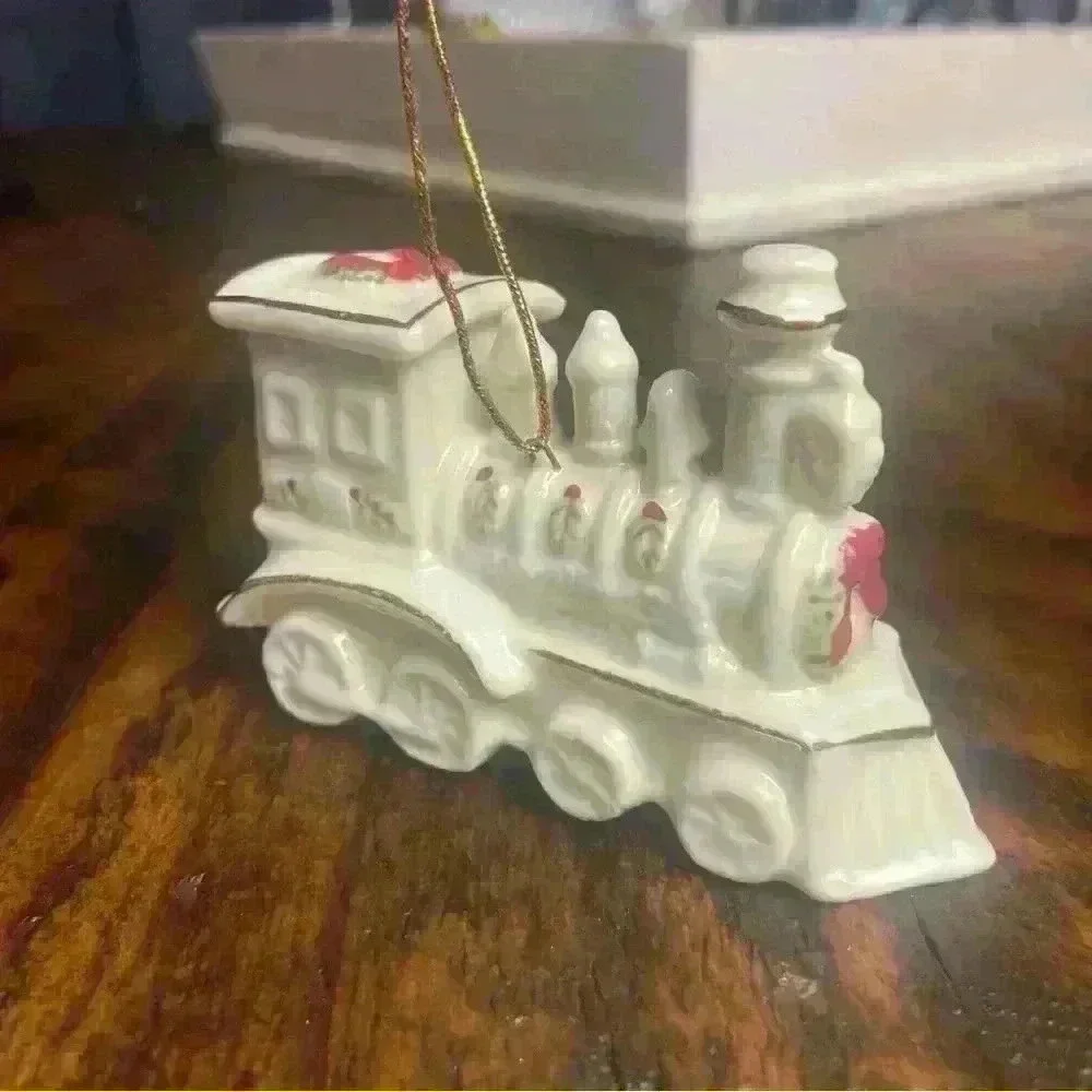 Porcelain Train Ornament, beautiful detailed painted train, with gold trim.